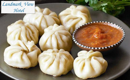 Momos - Hotel Landmark View Thousand Lights - Enjoy buy 2 get 1 offer on chicken momos.Delight in steamy plates!