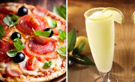 First Bite Cafe Mansarovar - Buy 1 pizza & get 1 country lemonade. Serve chilled & rich toppings! 