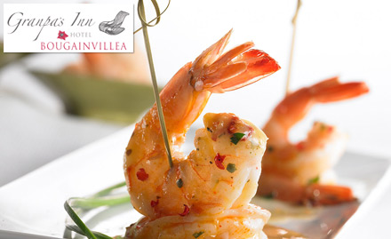 Bougainvillea Restaurants - Granpa's Inn Bardez - 25% off on total bill. Feast exotic seafood, veg & non-veg delicacies!