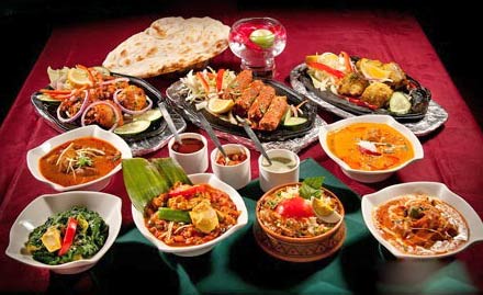 Aroma Restaurant Ulubari - Rs 144 for veg or non-veg thali. Spicy food & generous portions!