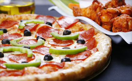 The Pizza Hub  Prahlad Nagar - Get a regular pizza free on purchase of large pizza at Rs 9