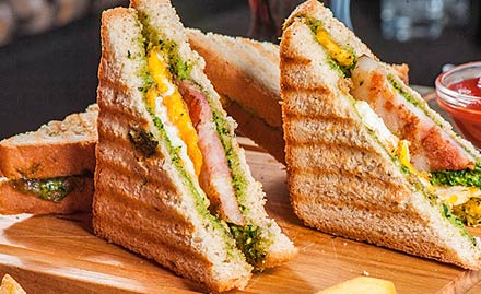 Indo Mexican Kirti stambh - Enjoy buy 1 get 1 offer on sandwiches, frankie, puff and desserts at just Rs 9