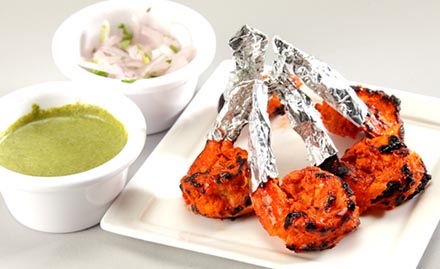 City Grill CBM Compound - Rs 508 for combo meal. Get chicken wings, chicken dum biriyani, soft drink & more!