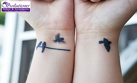 Solutions Salons And Academy Dadar East & West exists - 40% off on permanent tattoos. Ink your story!