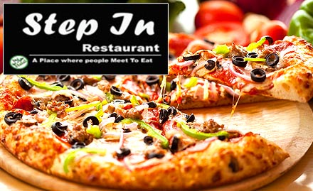 Step In Restaurant Ambattur - Buy 1 medium pizza and 1 regular pizza absolutely free. Delight your taste buds with cheesy pizza!
