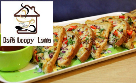 Cafe Loopy Latte Camac Street - 30% off on a minimum billing of Rs 300. Enjoy pasta, pizza, sandwich, iced tea, shisha and more!