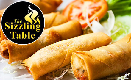 The Sizzling Table Vasai - 20% off on total bill. Enjoy Mughlai, Chinese, North Indian, Continental and Asian cuisines!