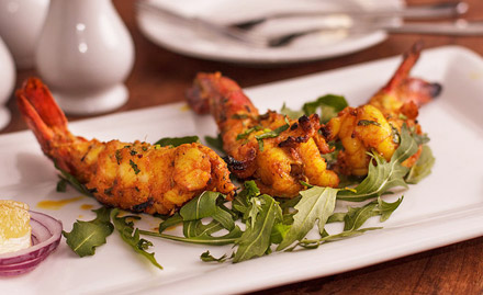 Seafood N Grill Utorda - 20% off on a minimum billing of Rs 300. Enjoy Goan, North Indian and Chinese dishes!