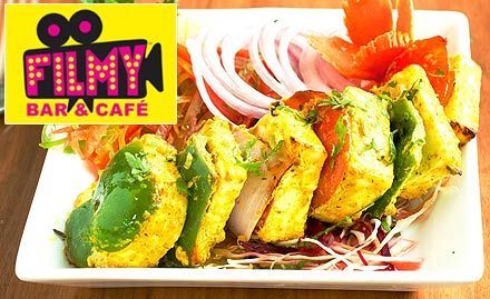Filmy Cafe And Bar Connaught Place - Enjoy 25% off on food bill. Also get a starter absolutely free with 6 beer pints!